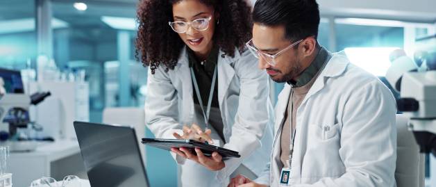 Scientists collaborating in laboratories and analyzing information